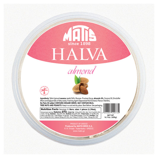 Round container of Greek halva with almonds sesame dessert