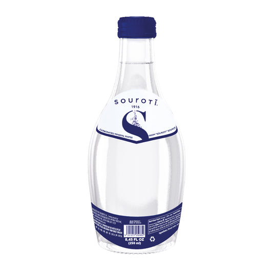 Glass bottle of Souroti sparkling mineral water with blue cap and label