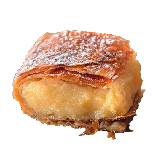 Pastry with layers of cream and pastry on a white background